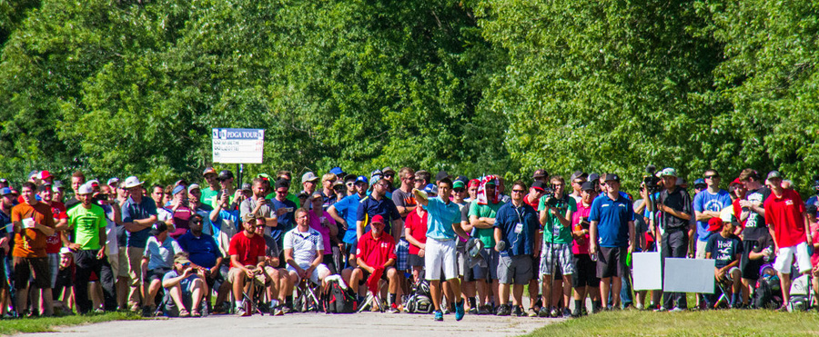 Paul McBeth and gallery at tee box